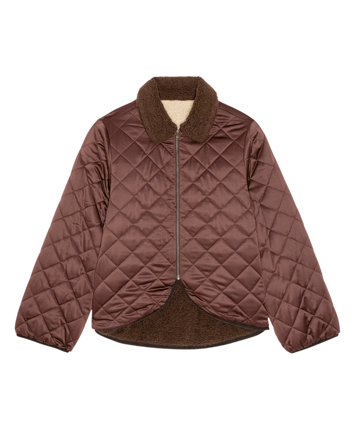 A brown diamond-quilted puffer jacket with a plush brown faux-fur collar and lining, featuring a front zipper closure, shown against a plain white background.