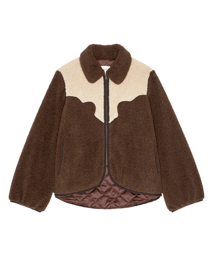 A brown sherpa fleece zip-up jacket with a cream-colored collar and yoke panel, featuring a dark brown quilted lining at the hem.