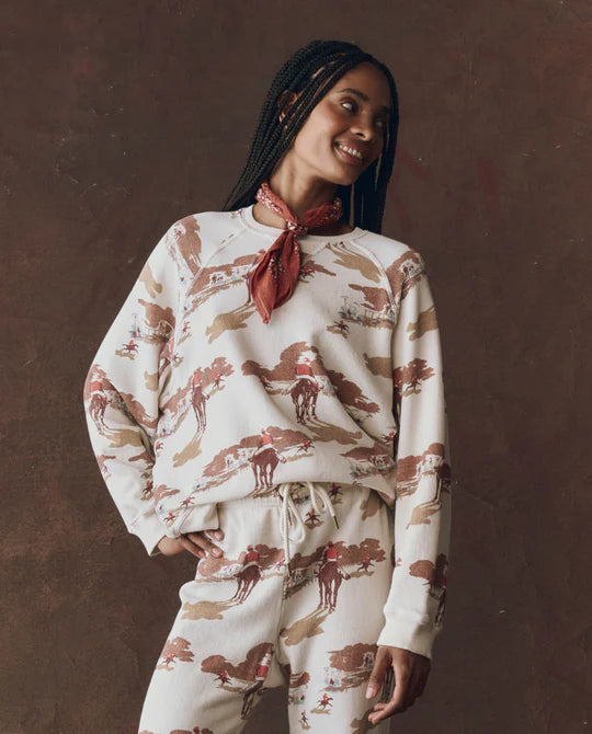 Woman wearing a patterned outfit with a brown background