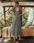 The Ruffle Coverup Black and Cream Check back