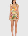 model wearing the april print romper on a white background