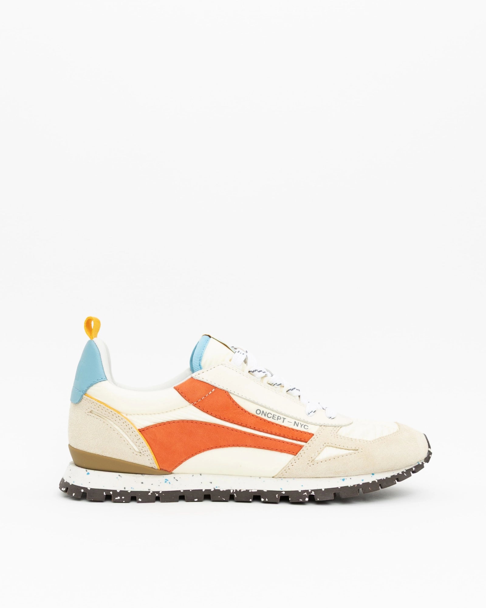White sneaker with orange accent on a white background