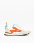 White sneaker with orange accent on a white background