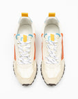 Pair of white sneakers with orange, blue and yellow accents on a white background
