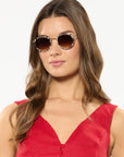 Tate Domino 18k Sunglasses on model with average, oval face shape