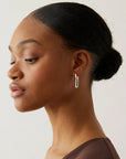 Teeni Detachable Link Earrings in Two-Tone side view on model