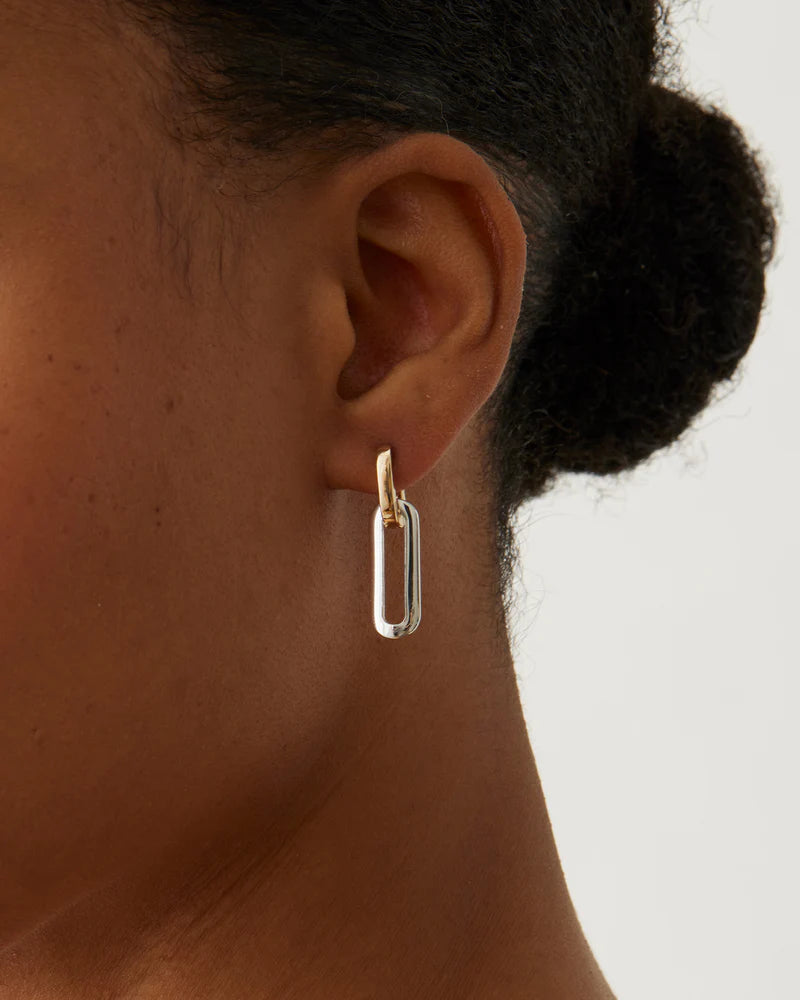 Teeni Detachable Link Earrings in Two-Tone closer up side view on model