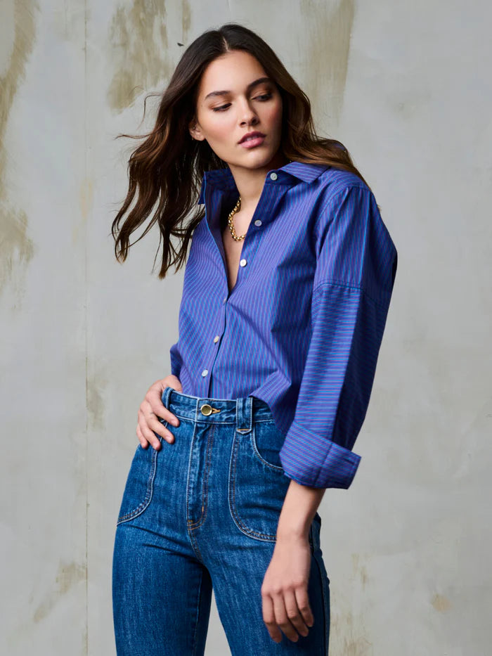 Amita Stripe Top close up, tucked in jeans