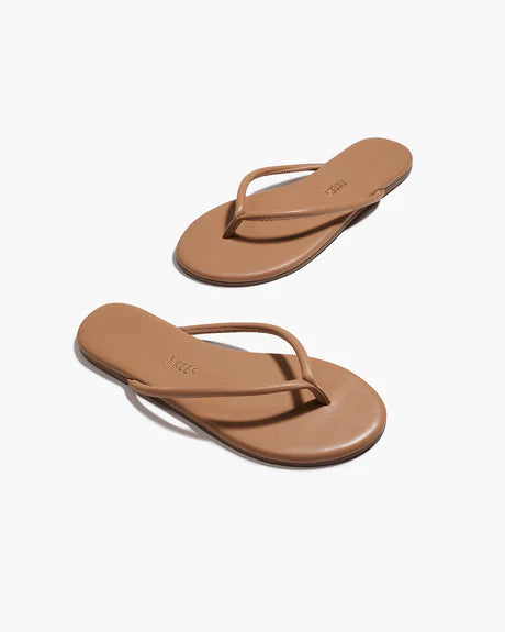 Tubular Lily Sandal in Cocobutter partial aerial view in zig zag formation on white background