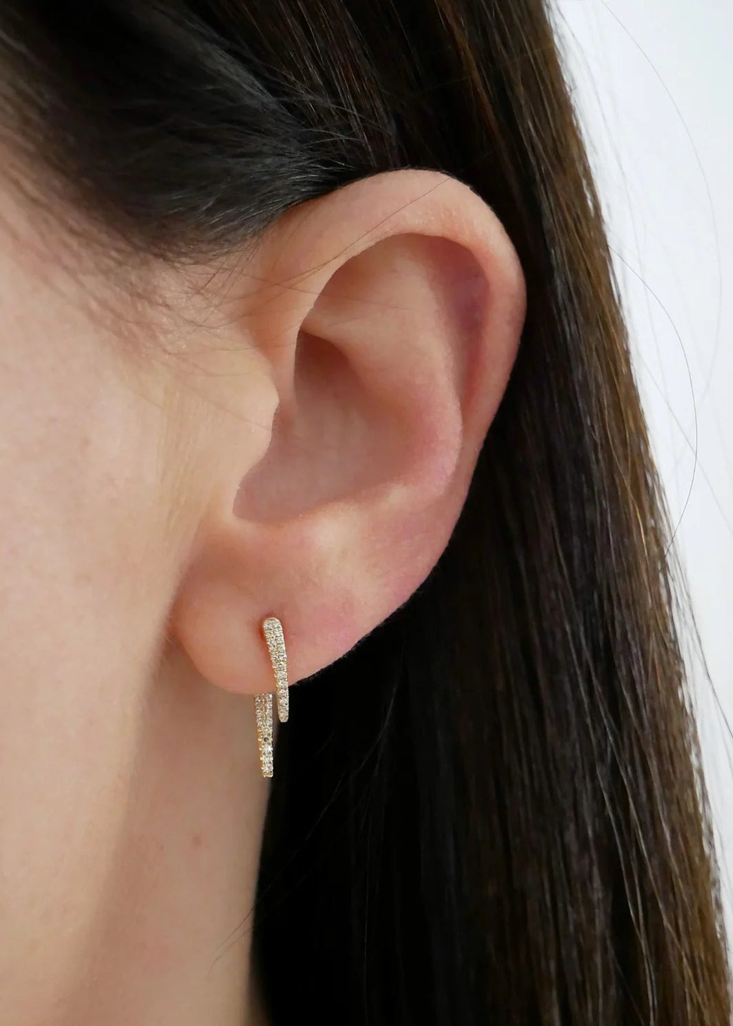 Single Diamond Hook Stud Earring on ear