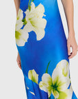 detail view of a blue dress with white flowers