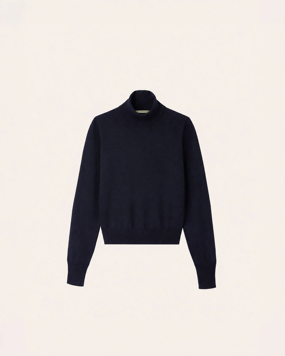 A dark navy blue knit mock neck sweater displayed on a clean, solid off-white background.