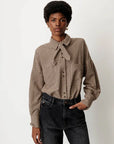Cecily Top front view on model with shirt tucked in