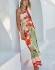 Dounia Dress on model in front of white building