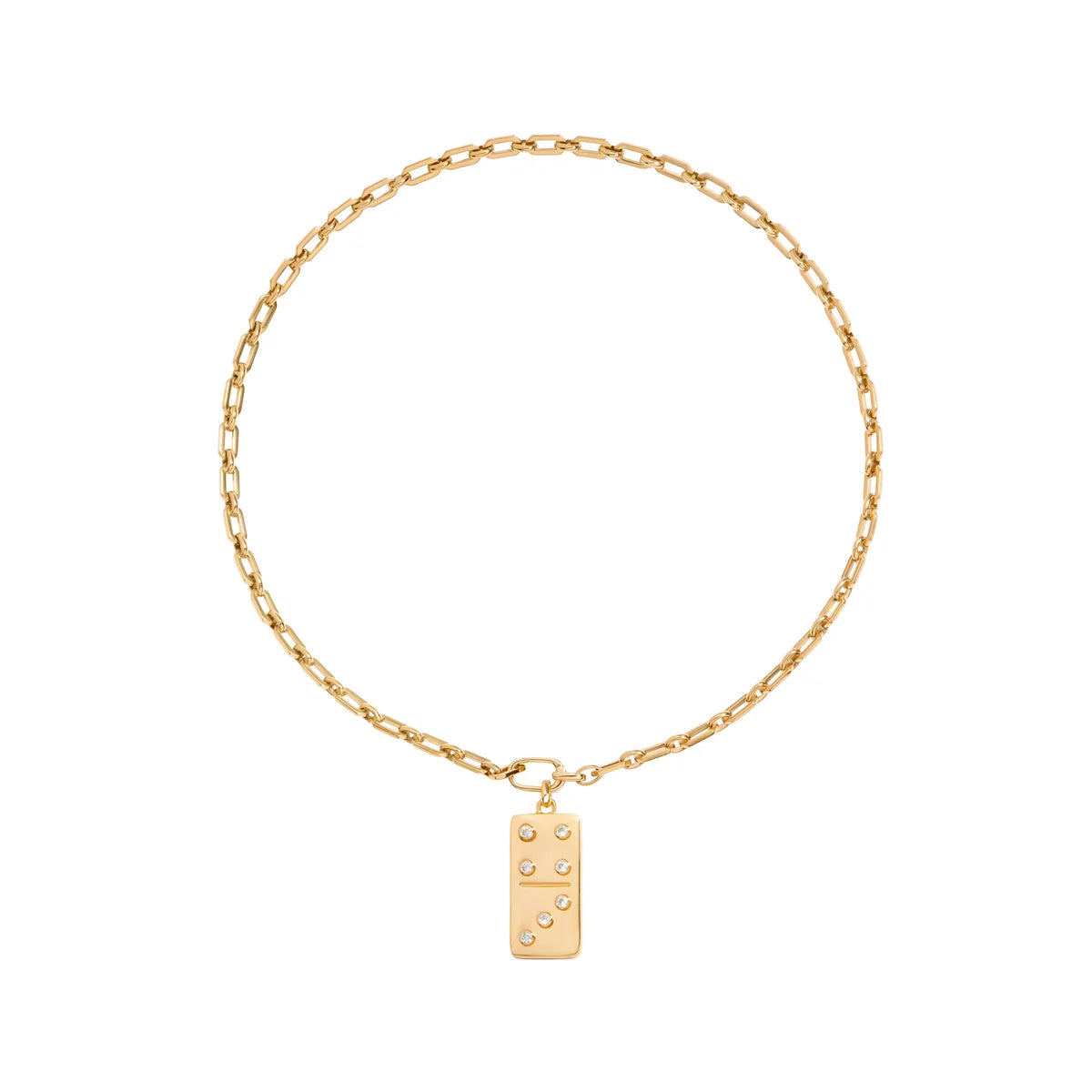 A gold chain necklace featuring a small rectangular domino pendant with raised dots, displayed against a solid white background.