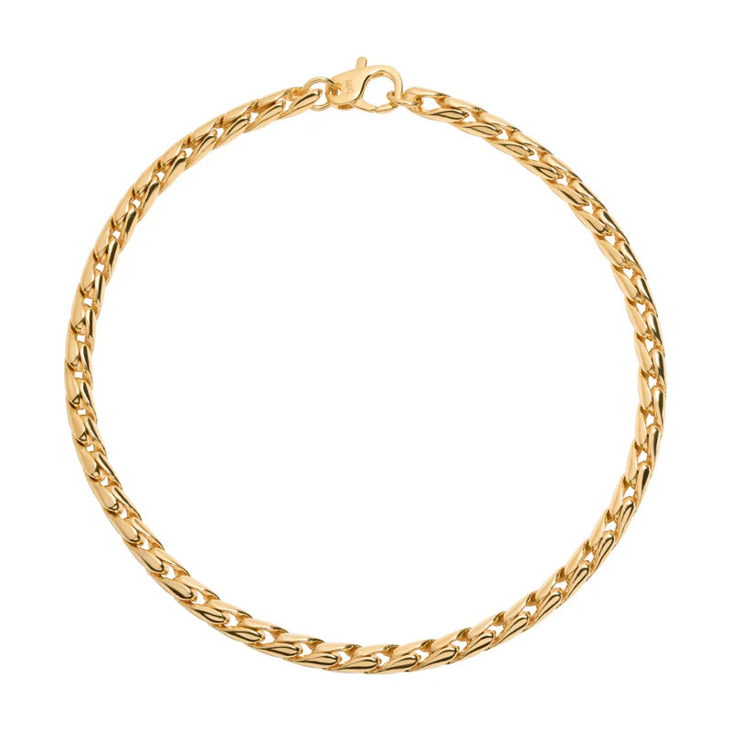 Gold chain bracelet on a white background