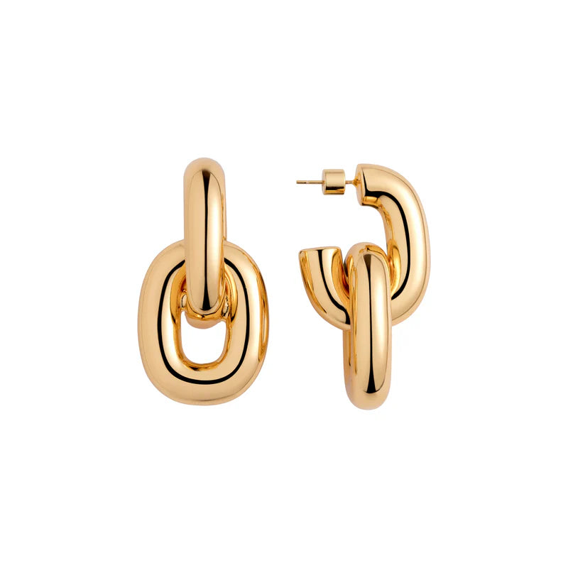 Gold hoop earrings on a white background