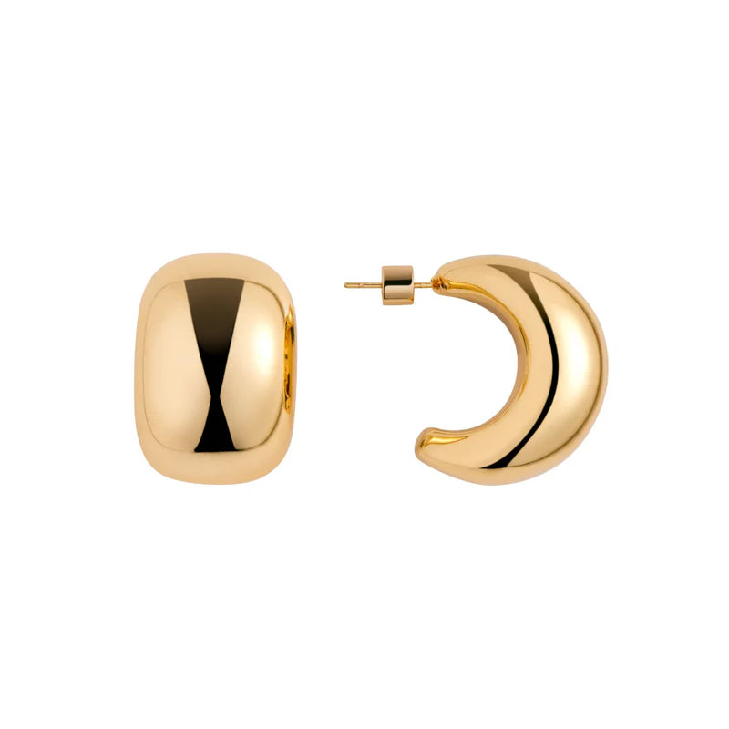 Gold hoop earrings on a white background
