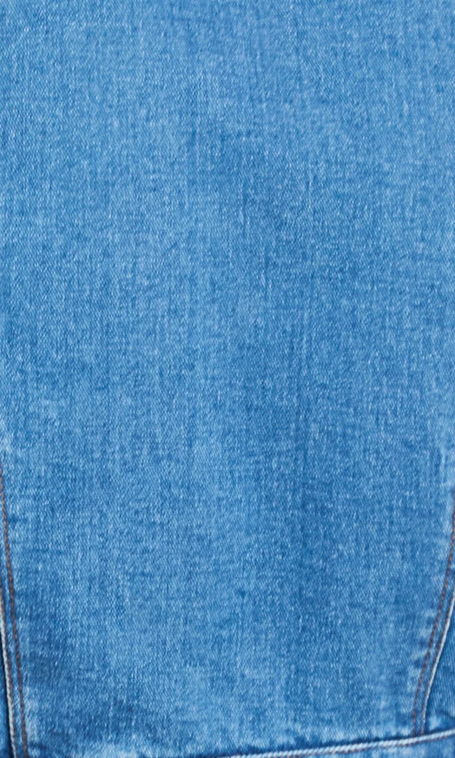 A close-up of blue denim fabric showing the texture and weave of the material.