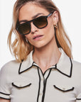 Zander Black + Black Tea Sunglasses on model with average square face shape
