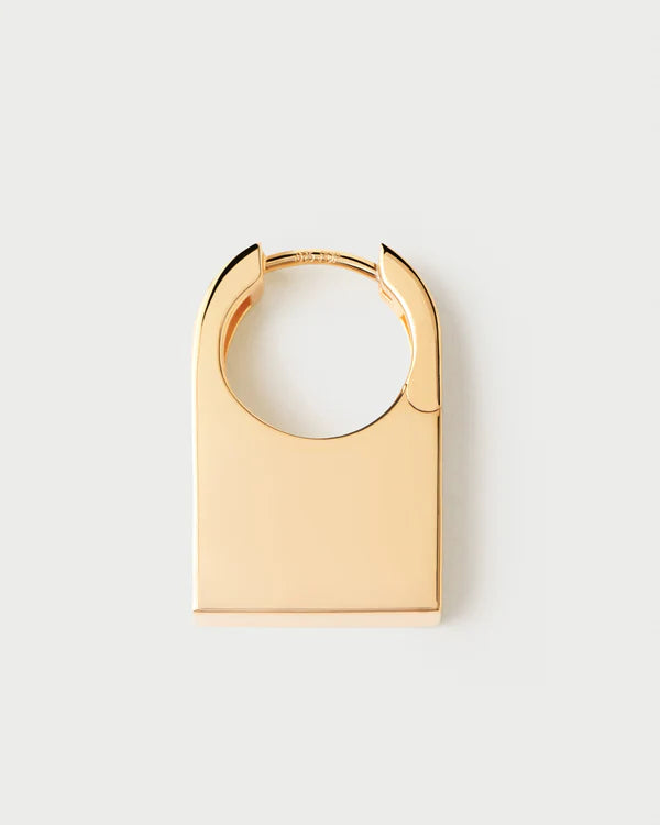Gold hoop earring on a white background