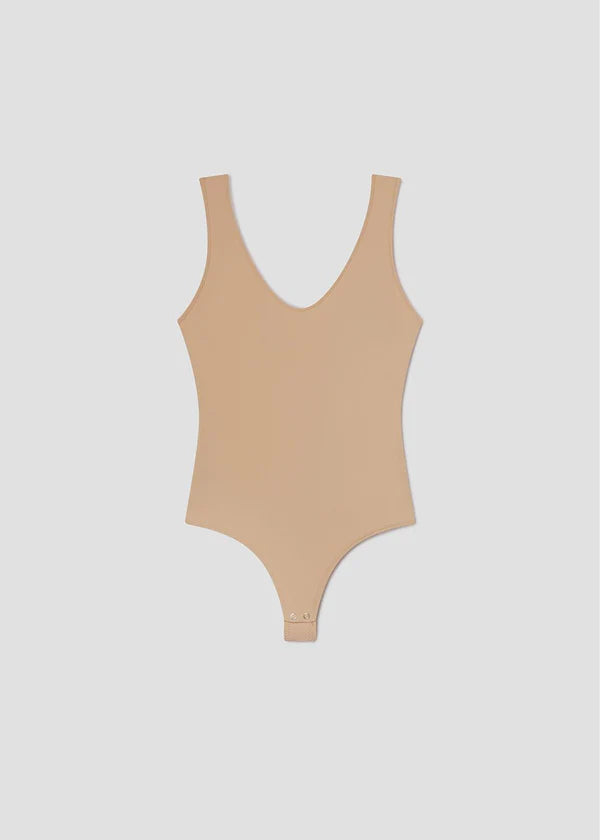 Tora Bodysuit in Nude laid flat
