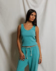 The Blondie Tank in Teal Blue front view on model
