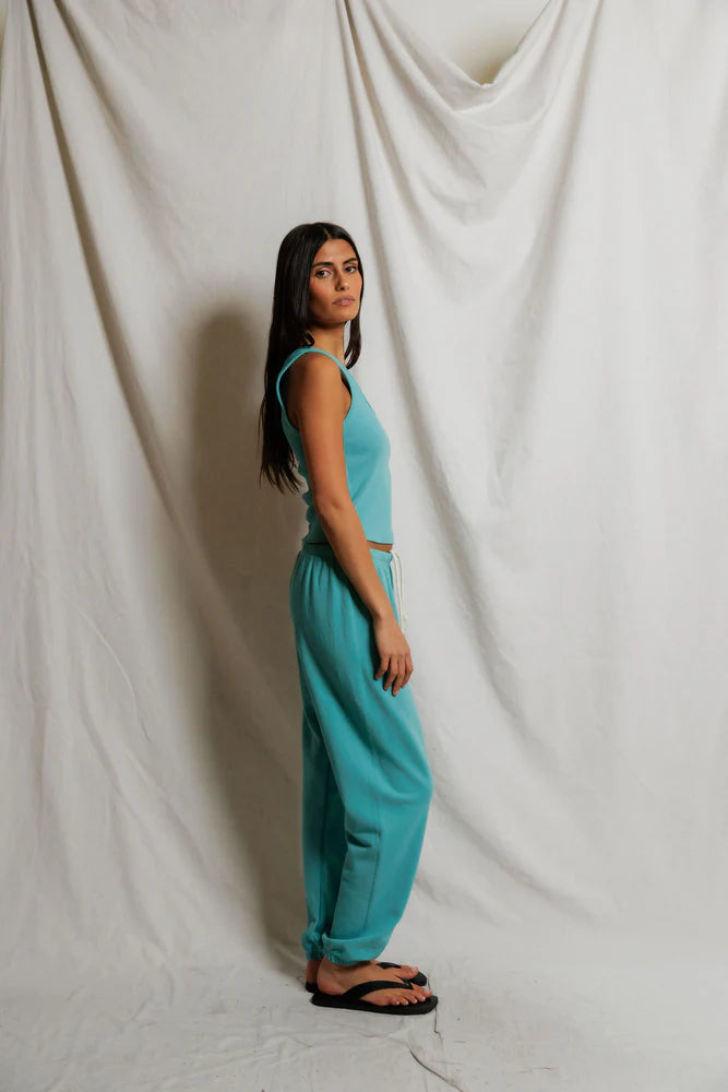 Johnny Sweatpant in Teal Blue full body side view on model