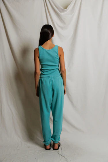 The Blondie Tank in Teal Blue back view on model
