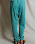 Johnny Sweatpant in Teal Blue close up back view on model