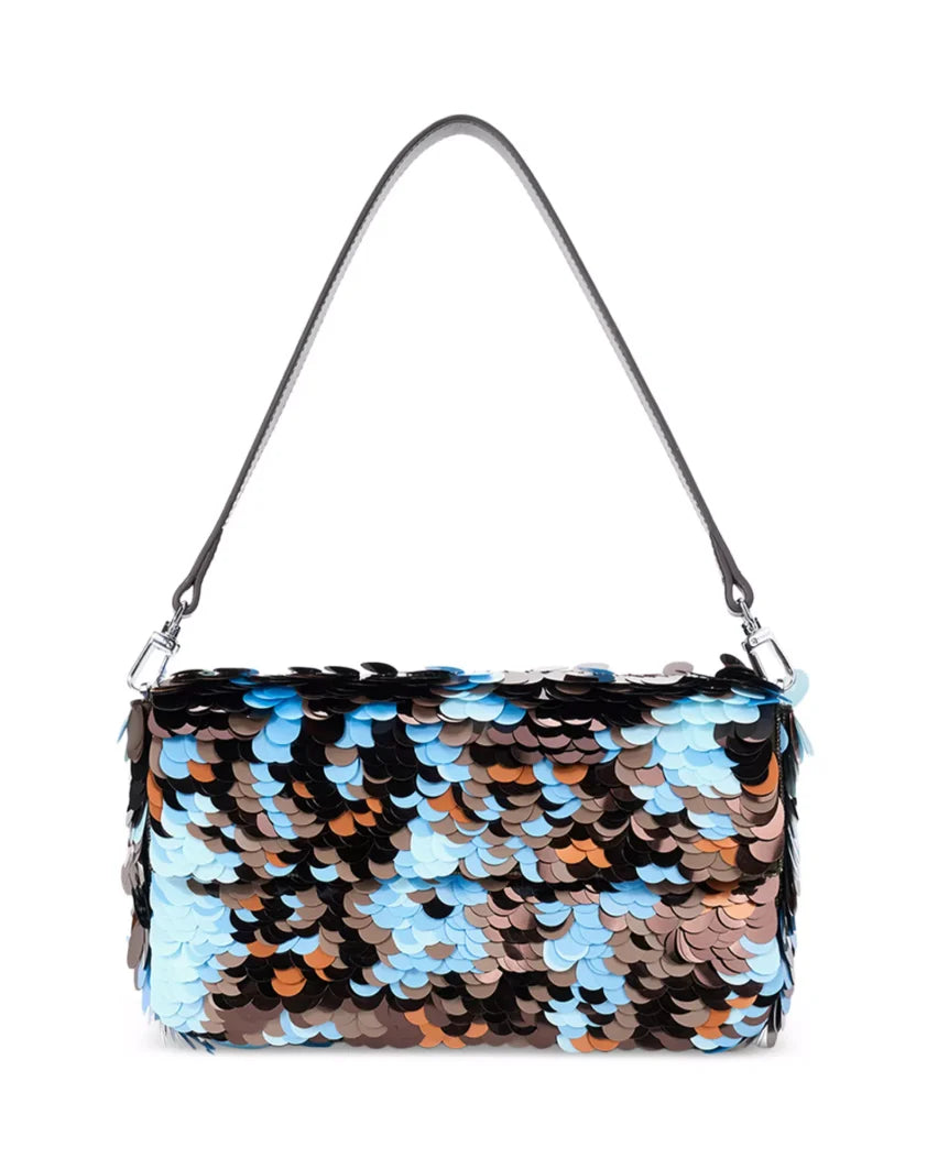 A rectangular shoulder bag covered in large, overlapping sequins in black, light blue, and bronze/copper tones, with a thin black shoulder strap and silver-tone hardware, shown on a plain white background.