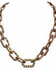 A chunky chain-link necklace with alternating matte brown and polished gold links, featuring a decorative gold clasp adorned with small clear rhinestones, shown against a plain white background.