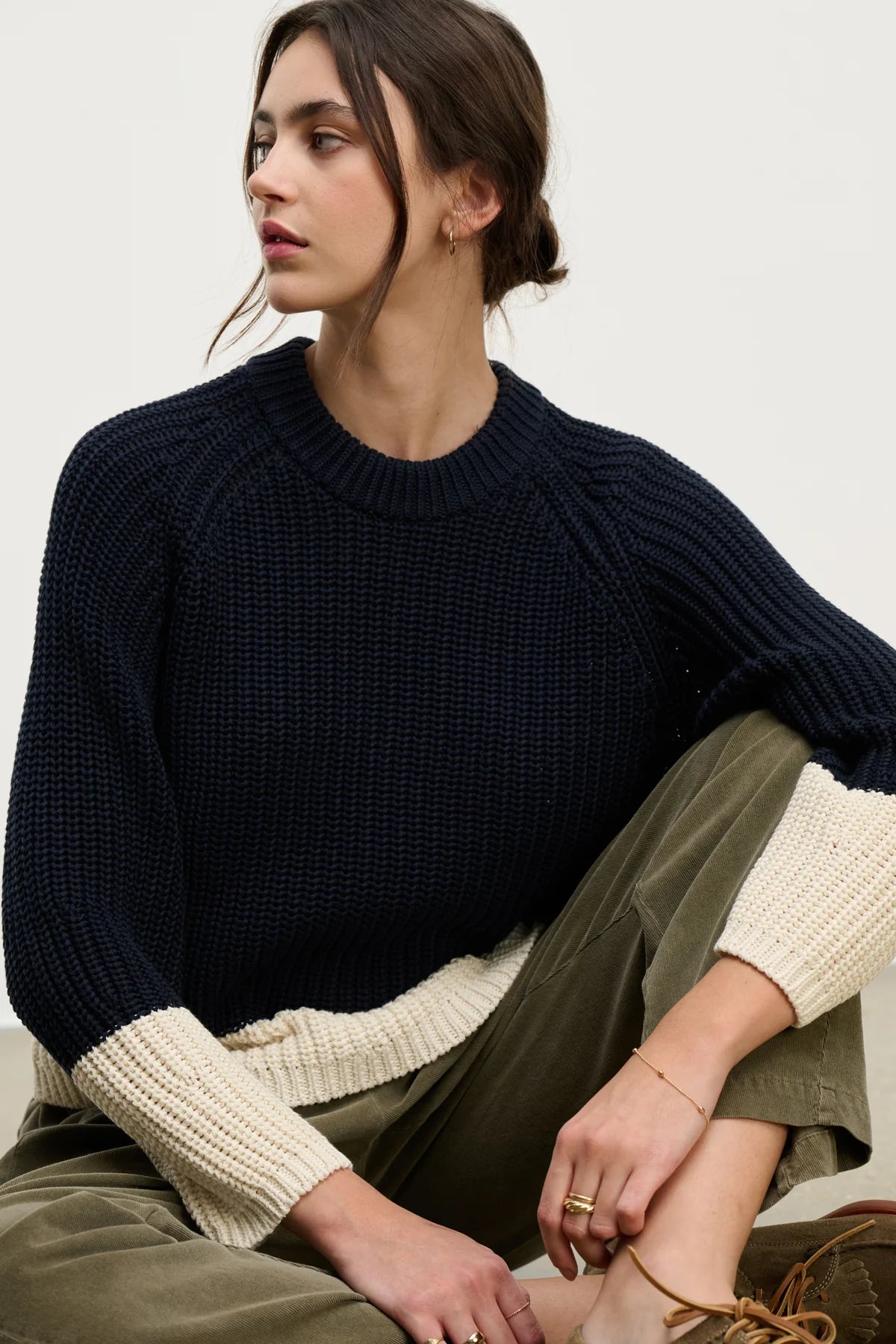 Shay Sweater model sitting