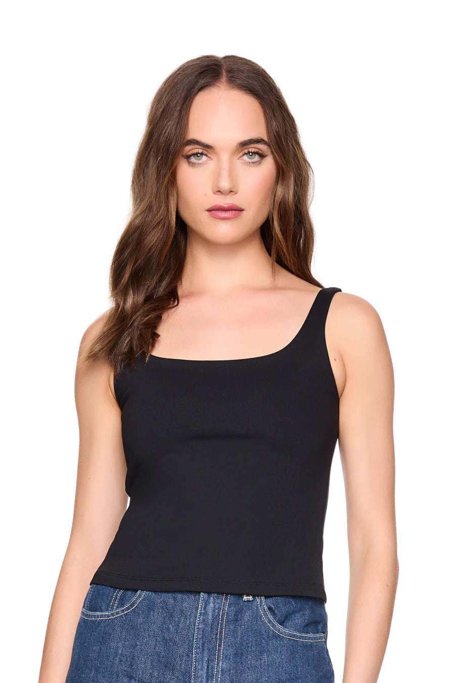 everyday tank in black on a model wearing jeans with a white background