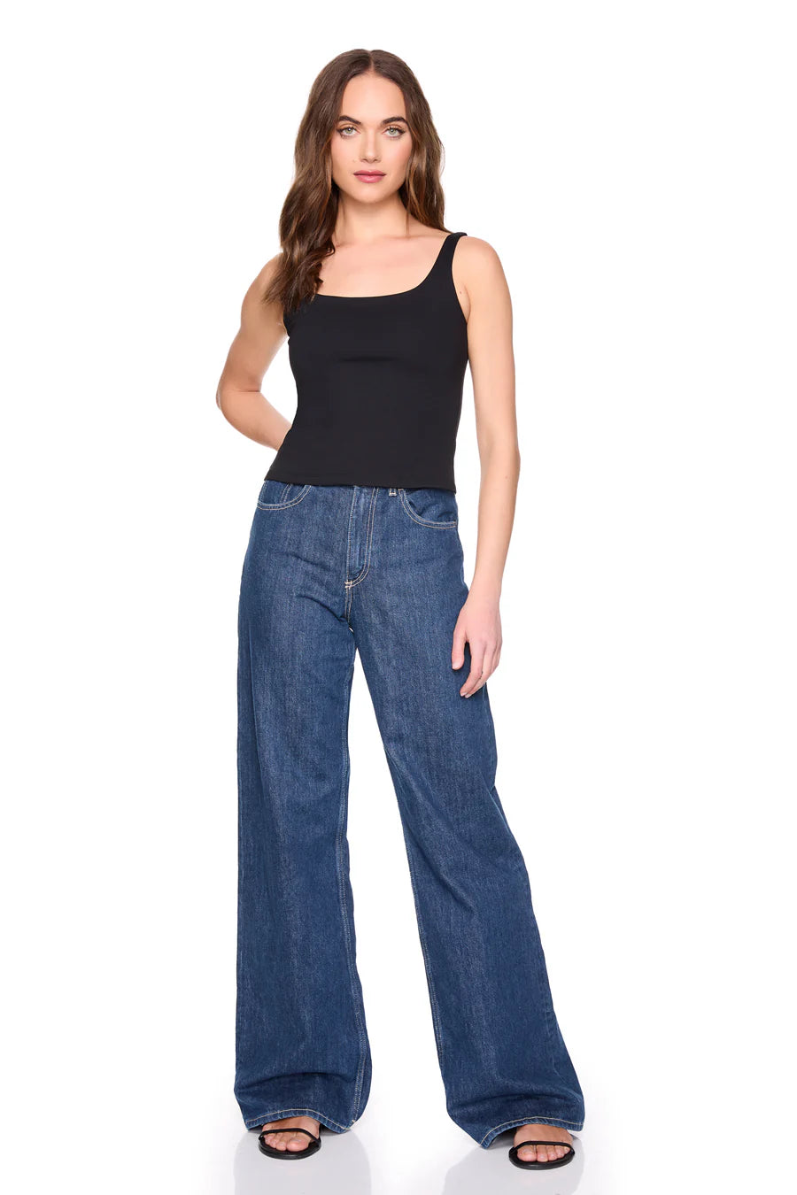 everyday tank in black on a model wearing jeans with a white background