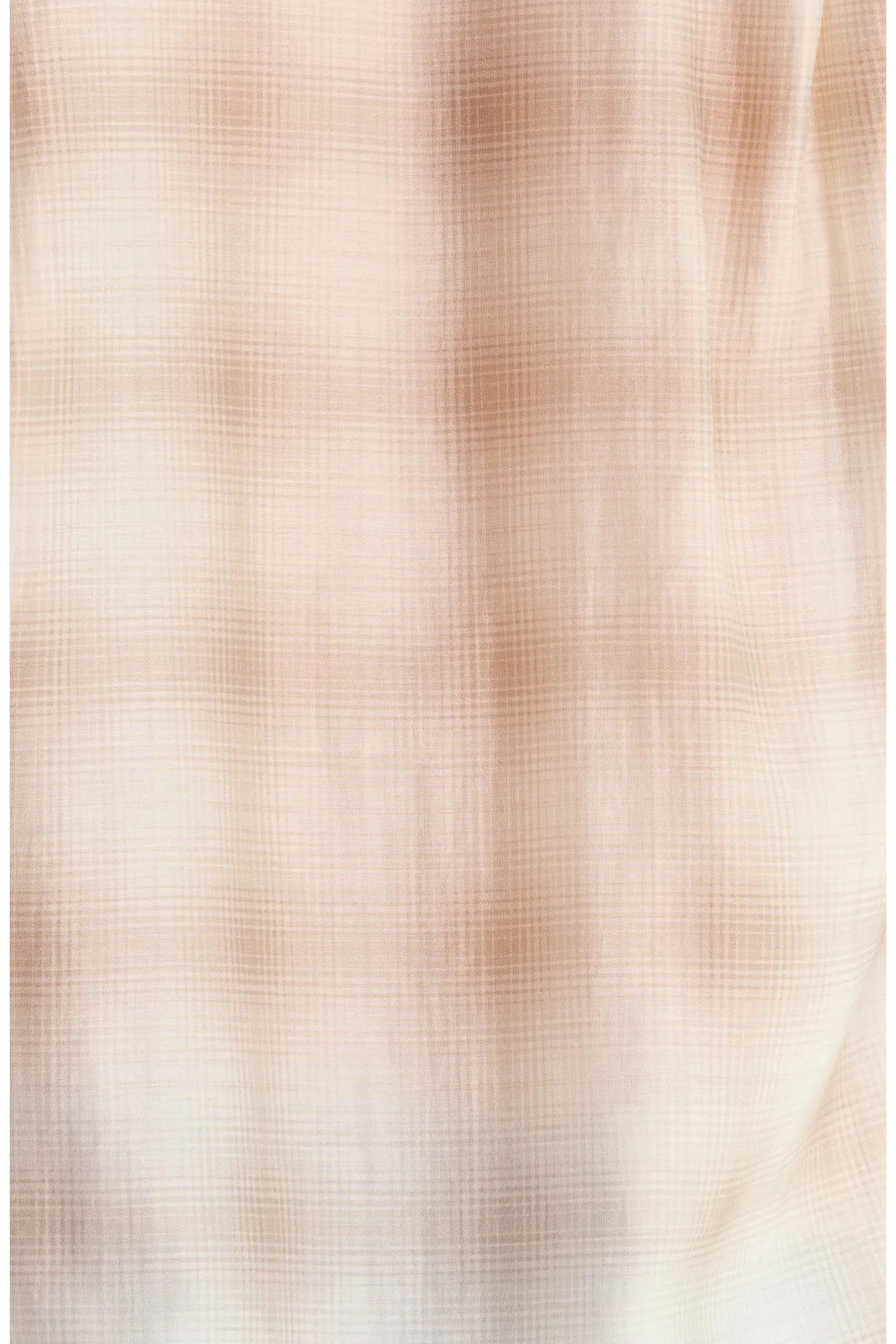 A close-up of a lightweight, semi-sheer fabric with a fine grid or gingham pattern in soft beige and light brown tones.