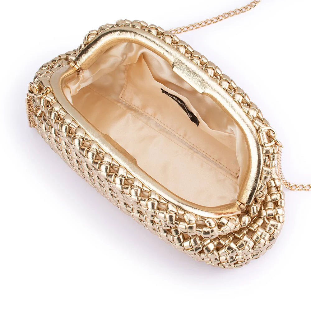 Gold clutch bag with intricate design on a white background