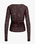 Dark floral-patterned long-sleeve top on a white background back view