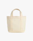 Beige tote bag on a white background