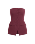 Maroon strapless top with buttons on a white background