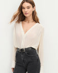 The Change Me Bodysuit with black jeans