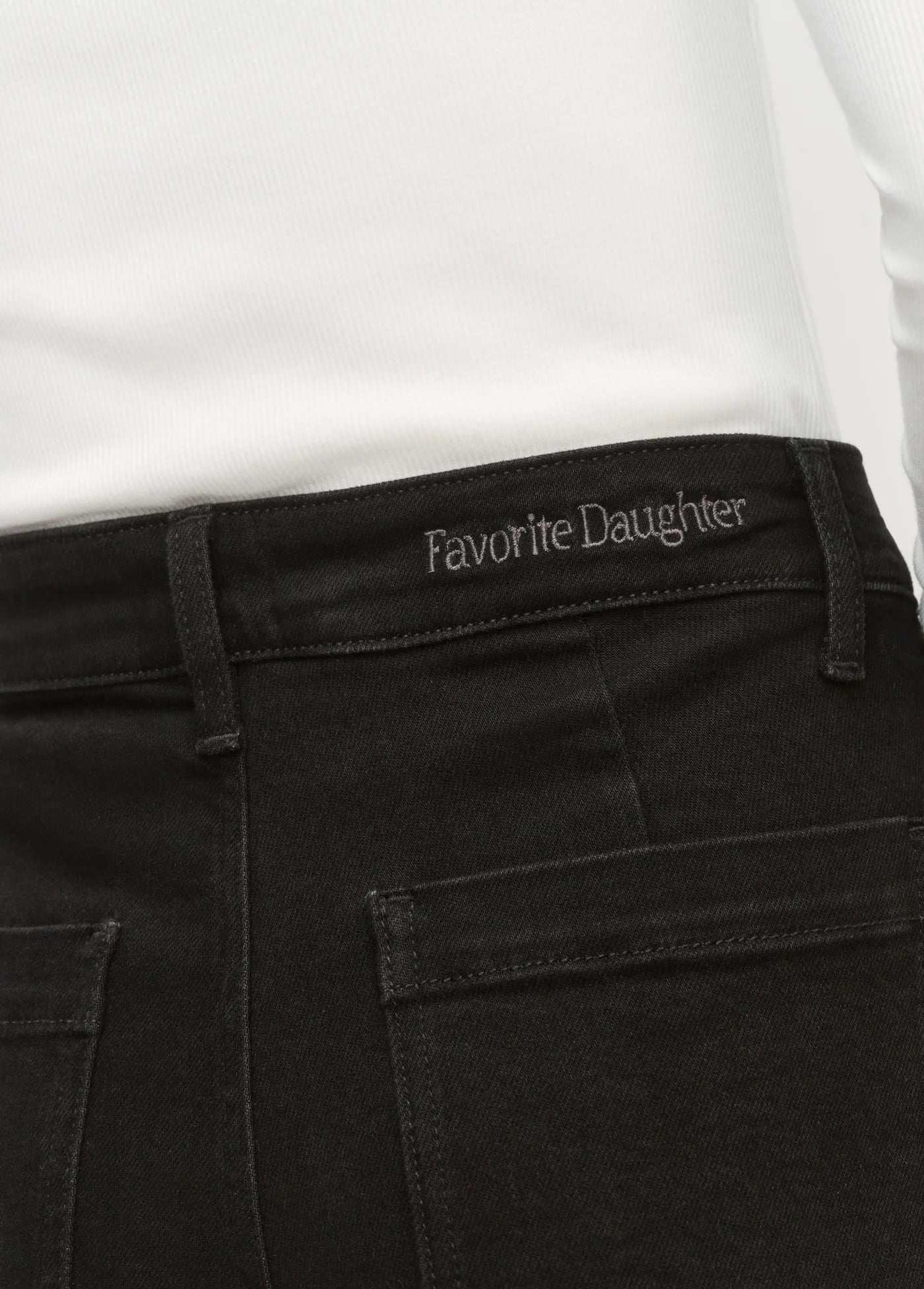 Black pants with &#39;Favorite Daughter&#39; branding on a white background