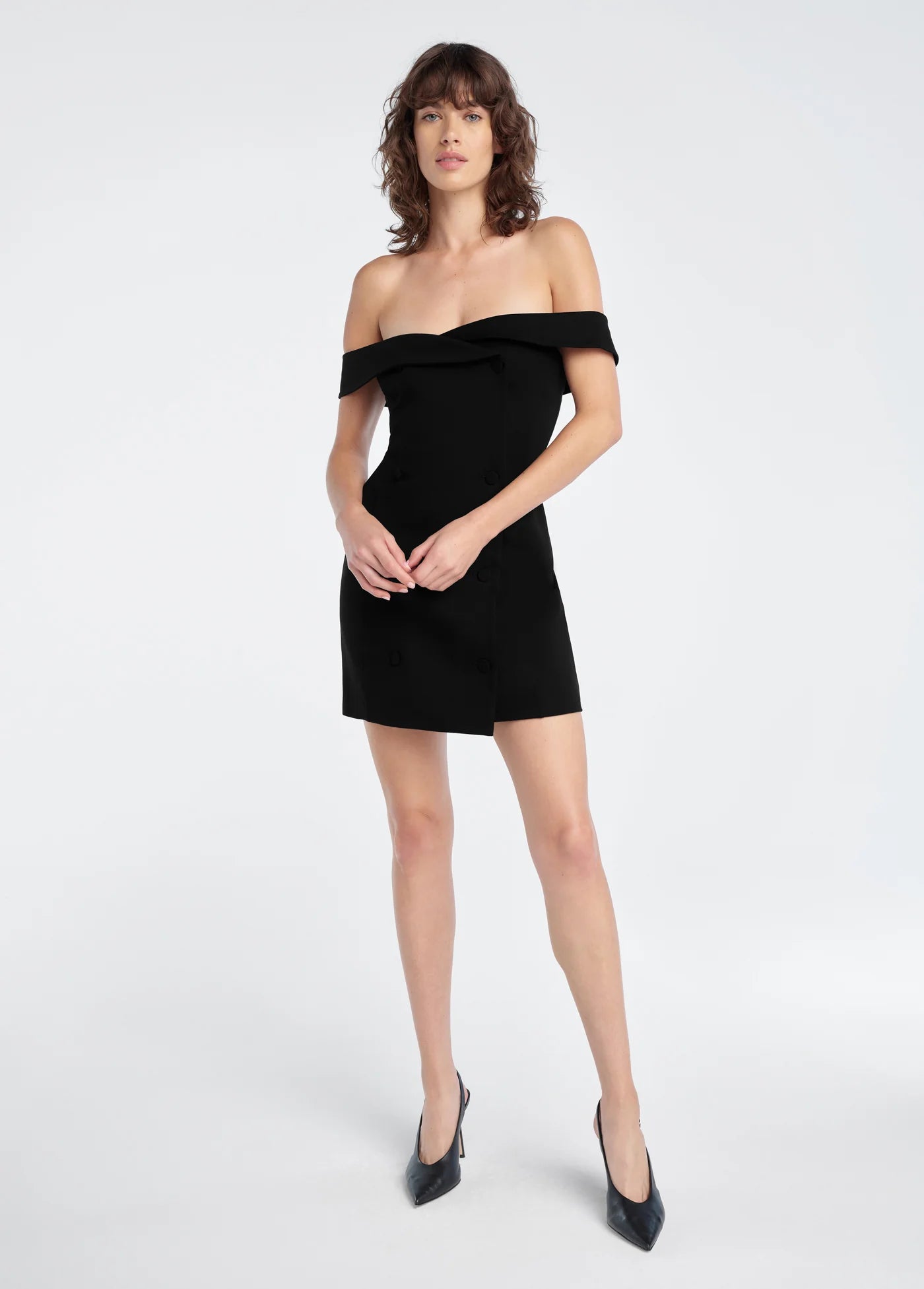 The Payback Dress front view, hands in front of body
