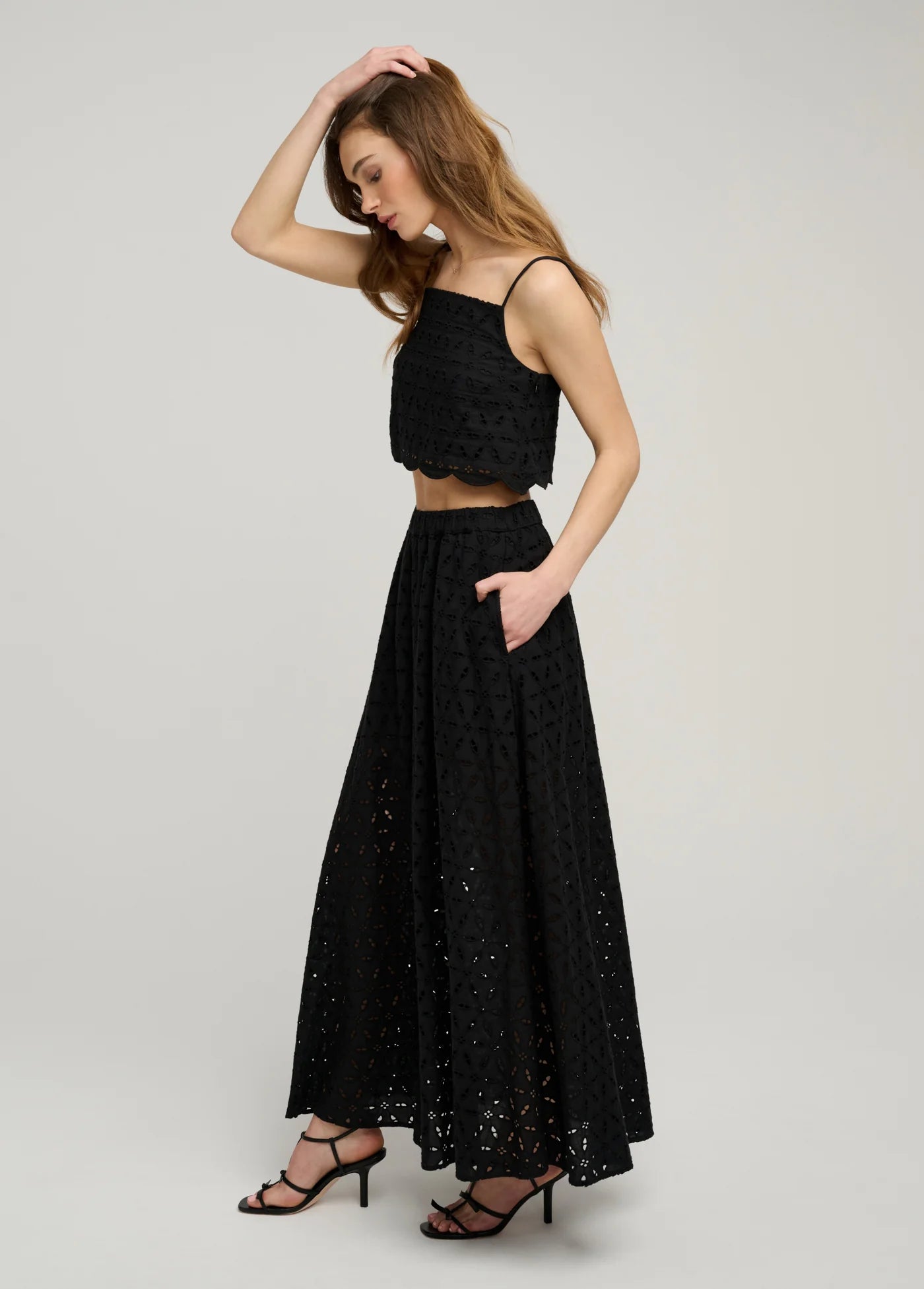 The Pretty Please Skirt full body side view with matching top on model
