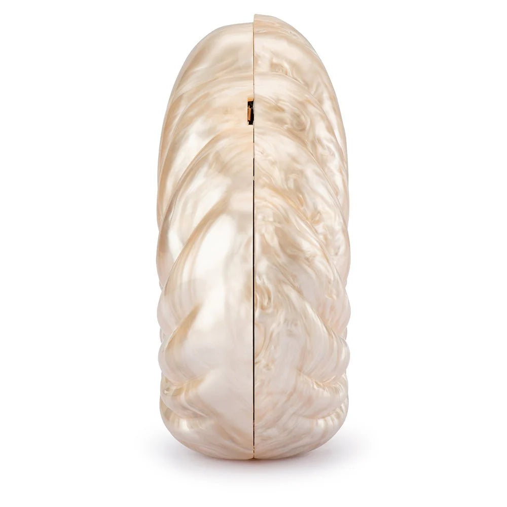 shell clutch side view on a white background
