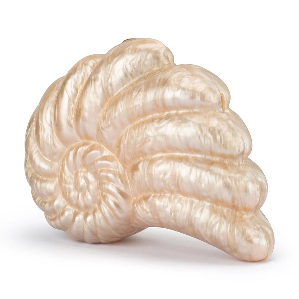 Decorative shell clutch with a wavy pattern on a white background