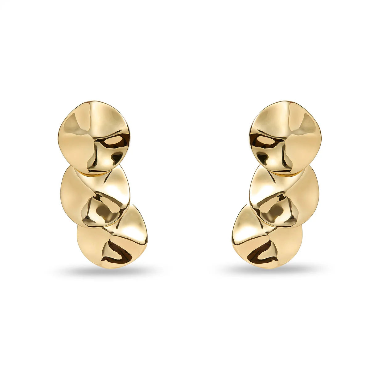 Pair of gold earrings on a white background