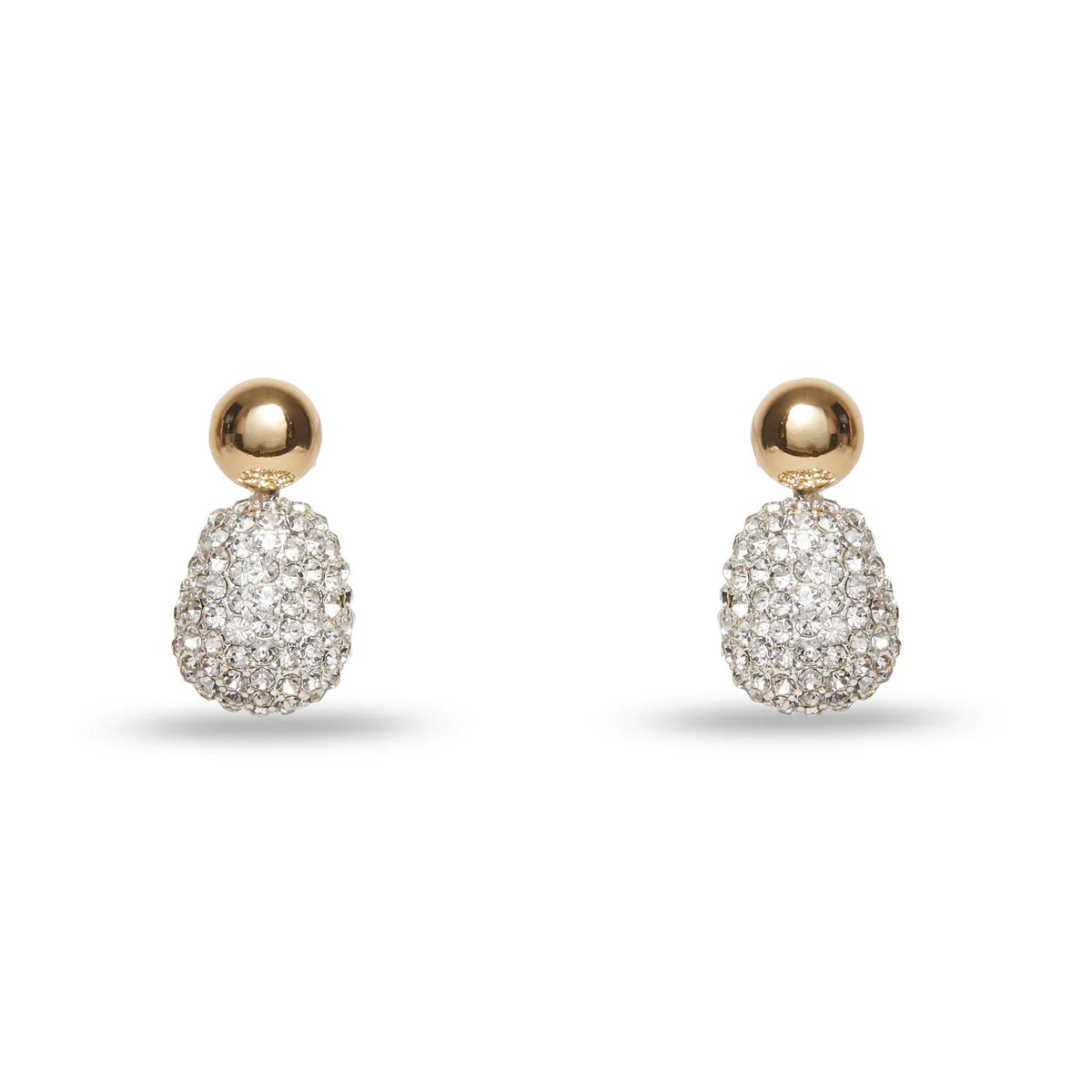 Pair of gold earrings with diamond-like stones on a white background