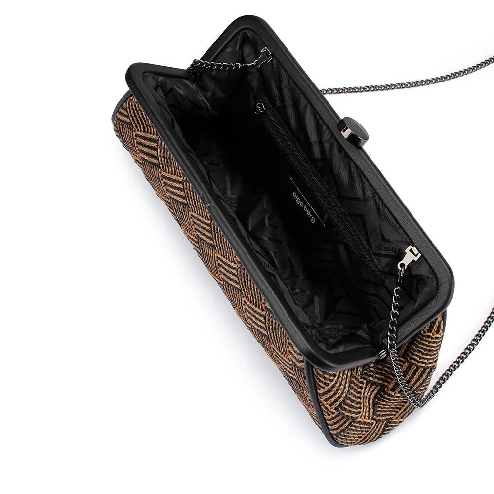 Patterned handbag with a chain strap on a white background open