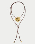 Necklace with a gold pendant on a white background